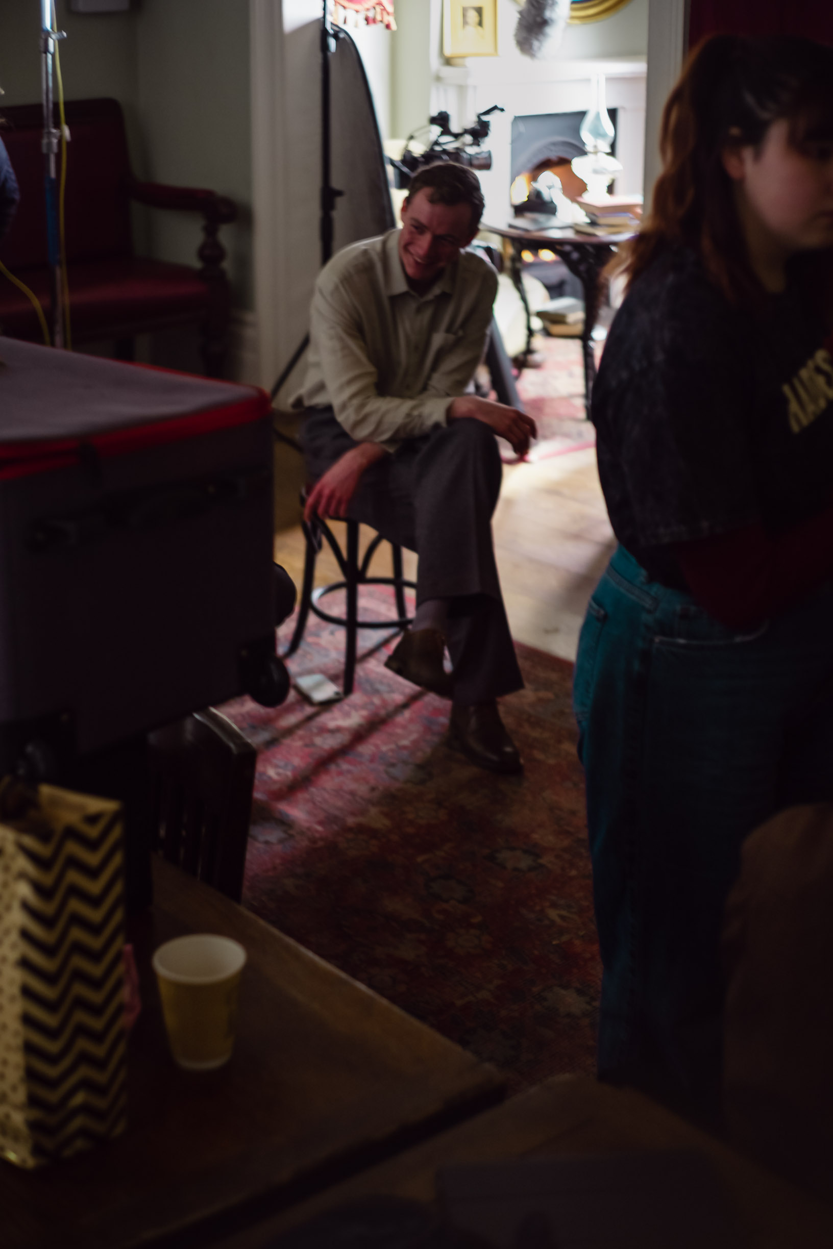 Guests mingling at an apartment party
